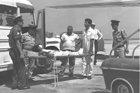Wounded POW transported