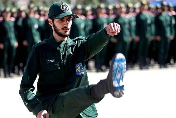 An Iranian Revolutionary Guard cadet with Israeli flag on sole of shoe