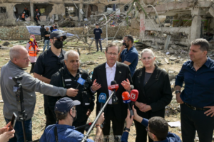 President Herzog in Dimona, at the site where an Iranian missile impacted, destroying apartment buildings March 2026